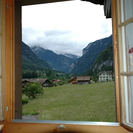 Holiday home Pristine Home In A Charming Village Large Grassy Sunbathing Area View Of The M Nch And Jungfrau Wilderswil